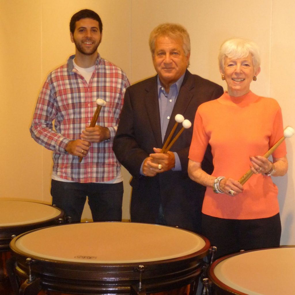 photo of symphony donors Howard and Thea pinskey with the ASO timpanist.
